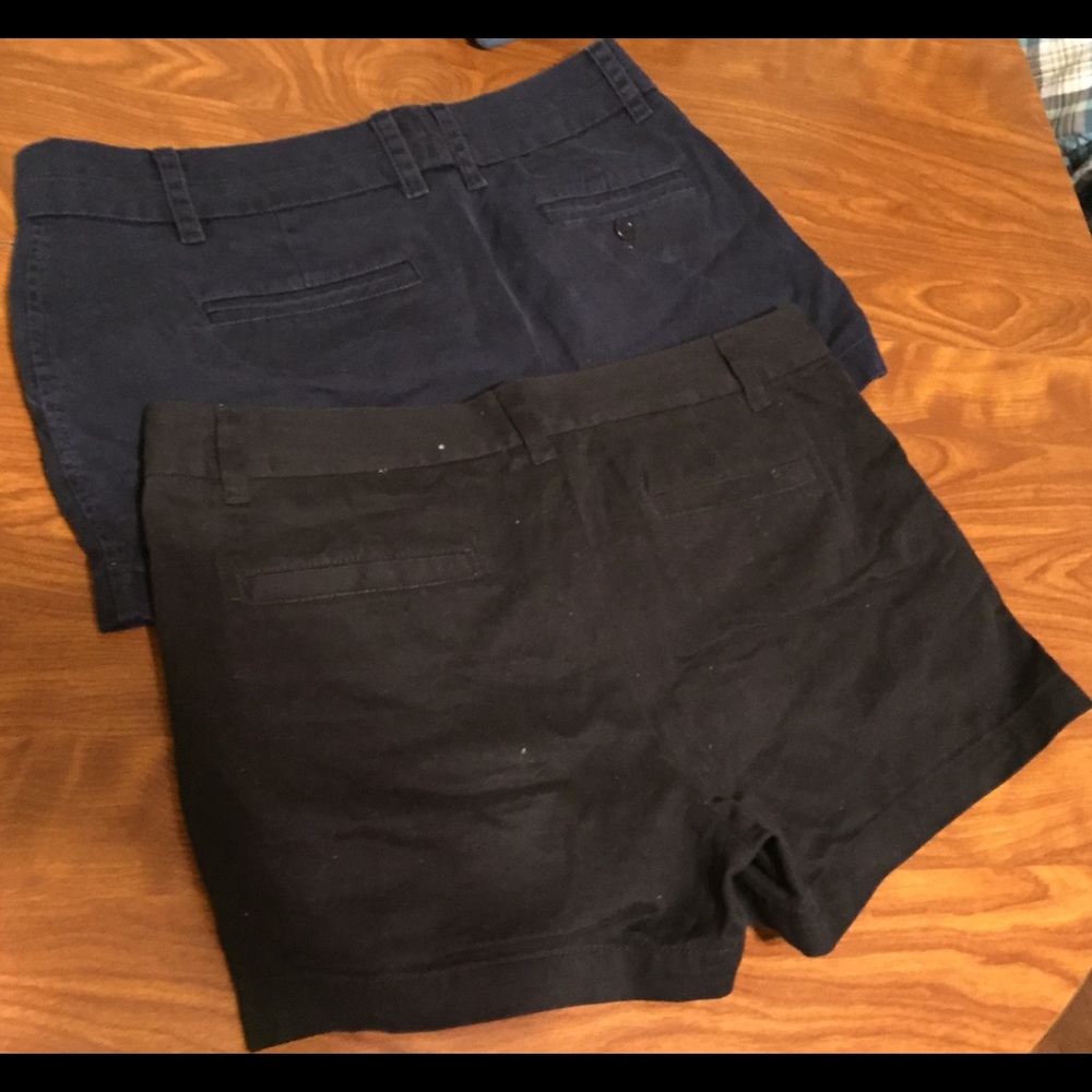 Navy blue and black shorts